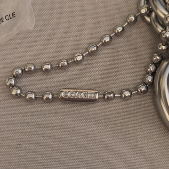 Coach | The Summer I Turned Pretty | Infinity Silver and Gold Keychain Bag Charm - Picture 10 of 16